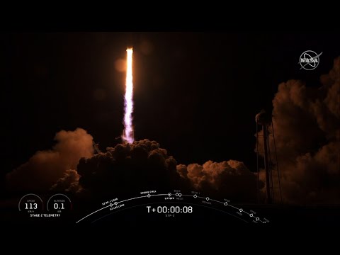SpaceX launched its heftiest rocket with 24 research satellites early Tuesday. It marked the military's first ride on a recycled rocket. Both side boosters landed back at Cape Canaveral, but the new core booster missed an ocean platform. (June 25)